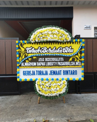 Papan Bunga Duka di Bilah Hilir